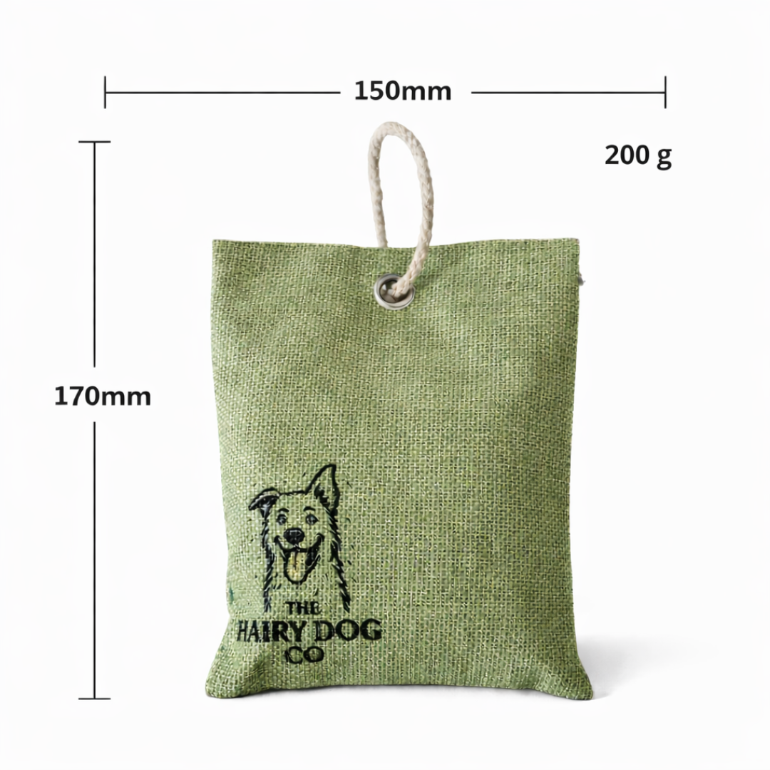 Green charcoal moisture and odour absorber bag with a dog illustration and text, shown with measurements on a white background