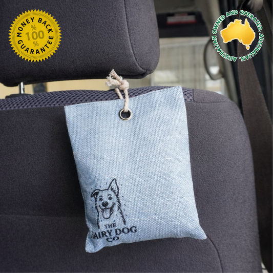 Blue Activated charcoal moisture absorber hanging from car headrest to remove wet dog smells and moisture, Australian owned and operated.